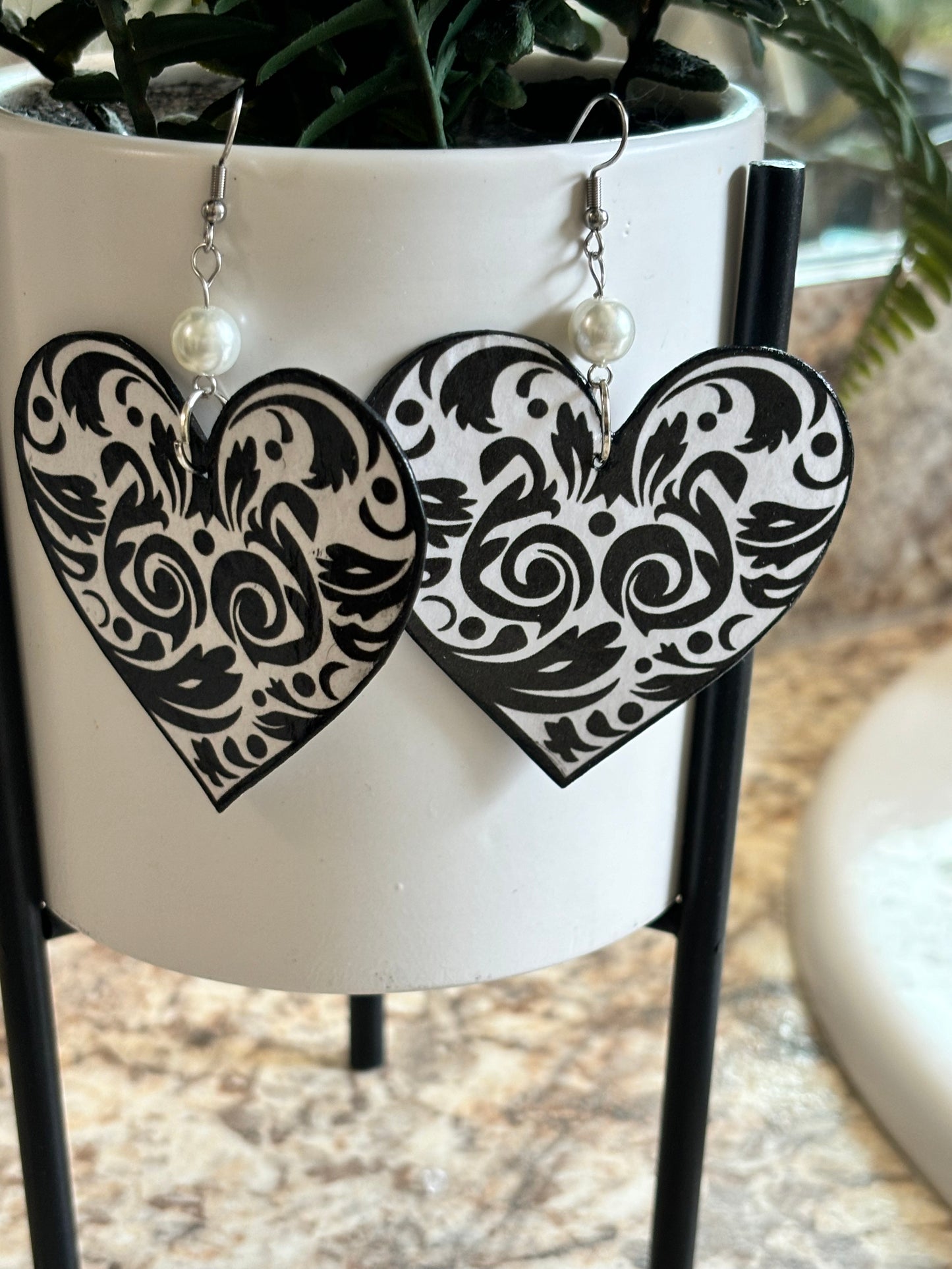 Heart & Bloom Earrings: Black & White Floral Elegance with Pearl Accent"